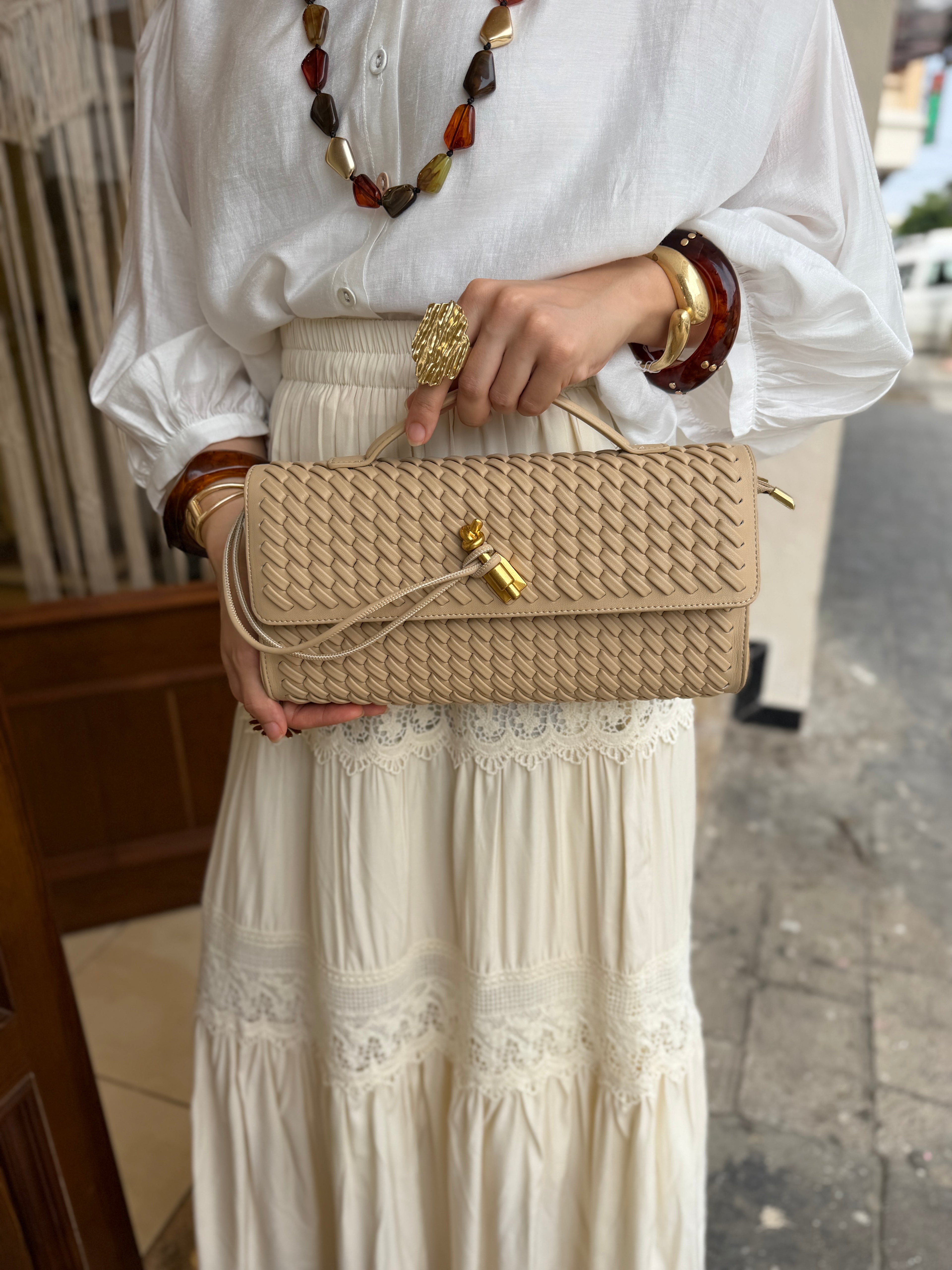Sac enveloppe en cuir tressé