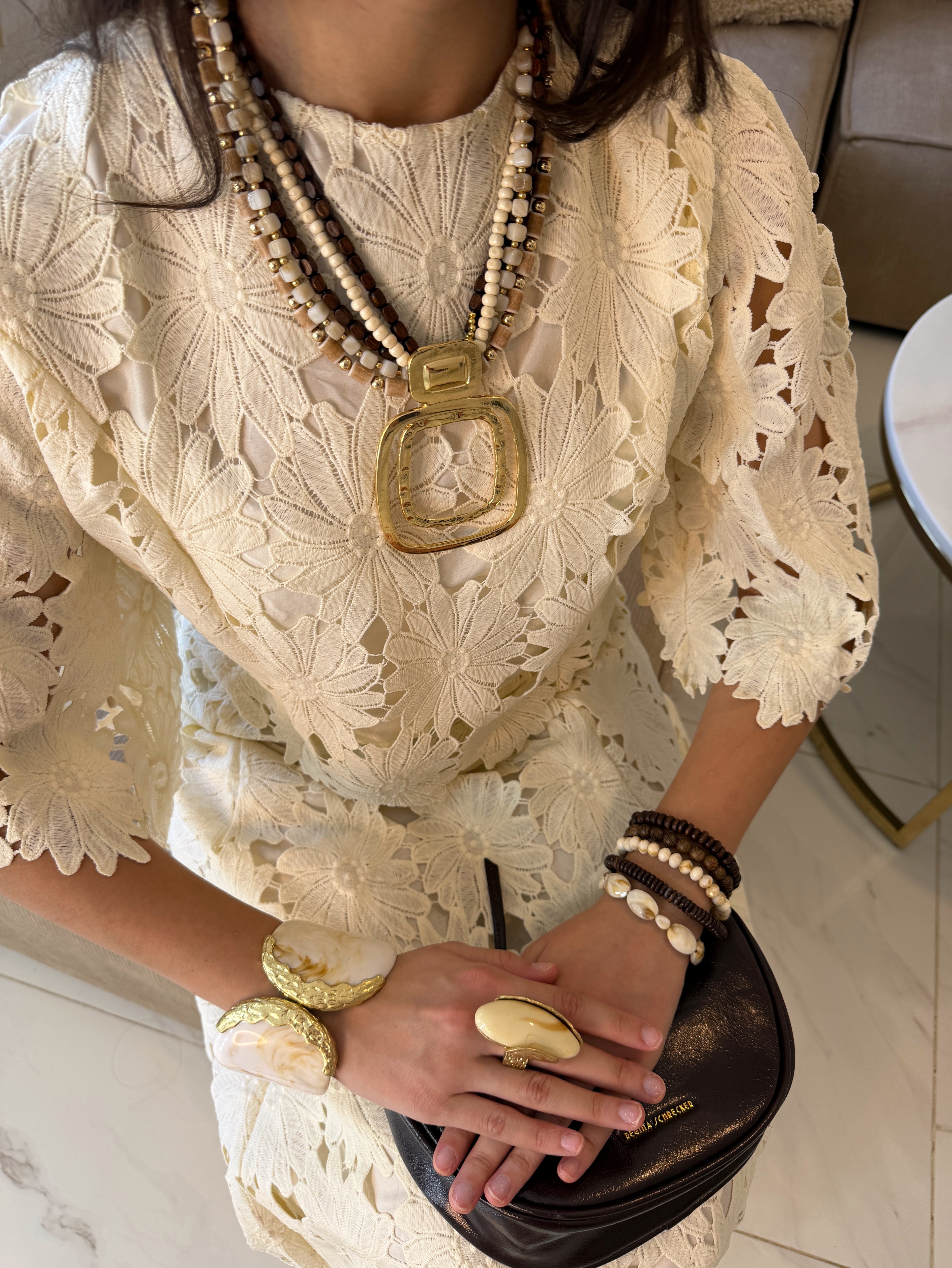 Collier Riviera multi chaînes pendentif doré