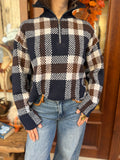Pull en laine col montant zip à carreaux