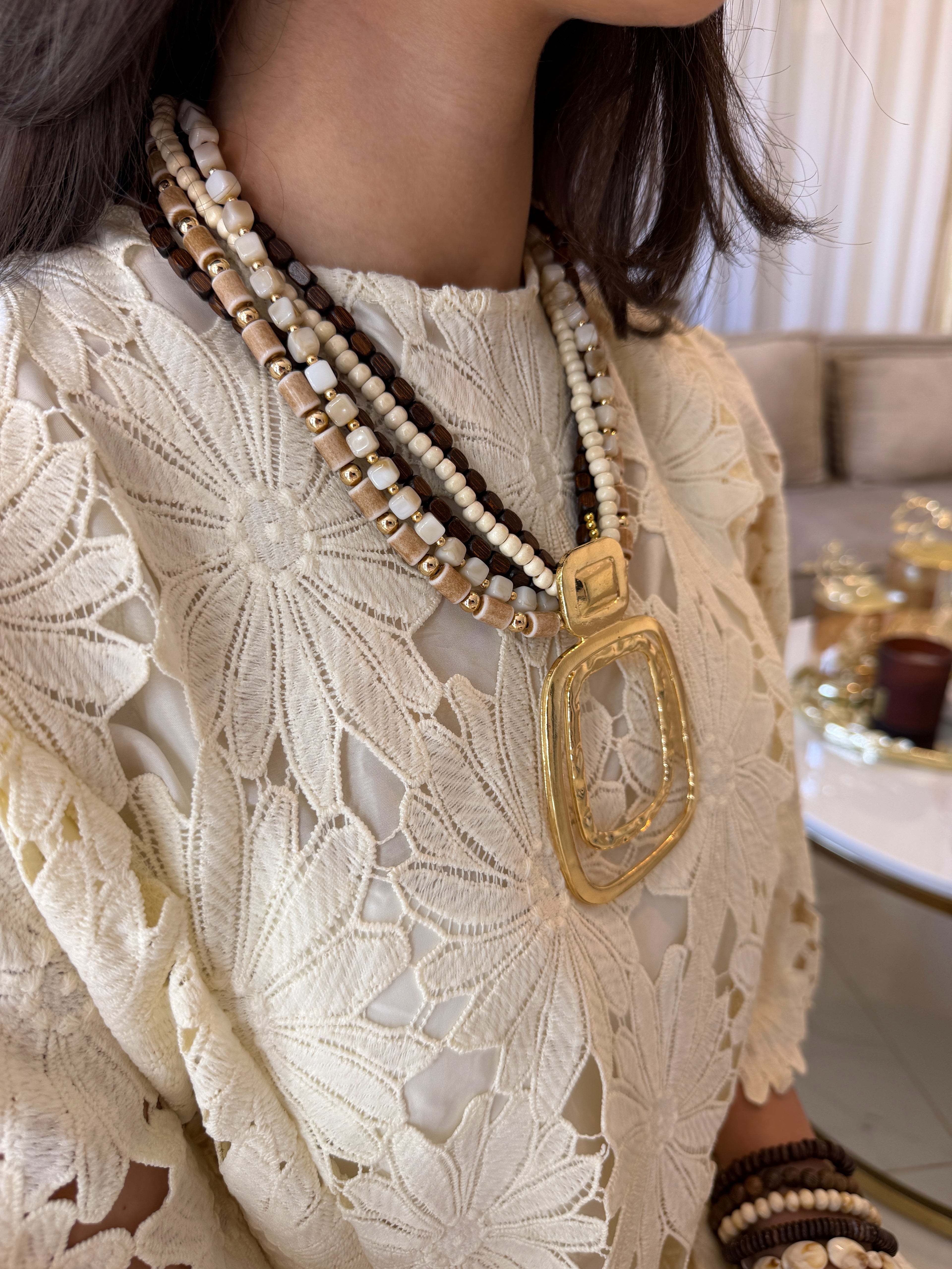 Collier Riviera multi chaînes pendentif doré