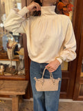 Pull col montant boutonné