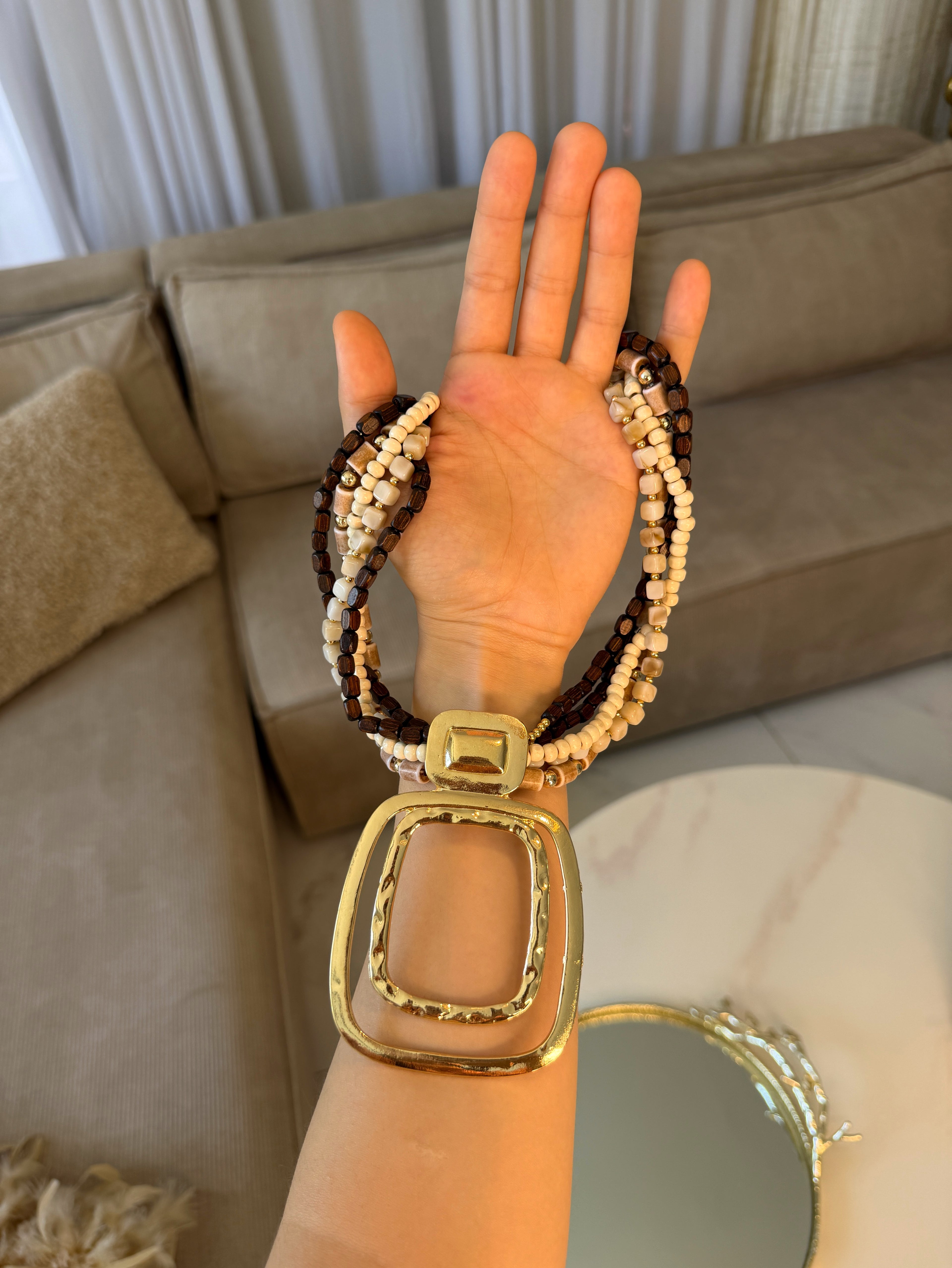 Collier Riviera multi chaînes pendentif doré