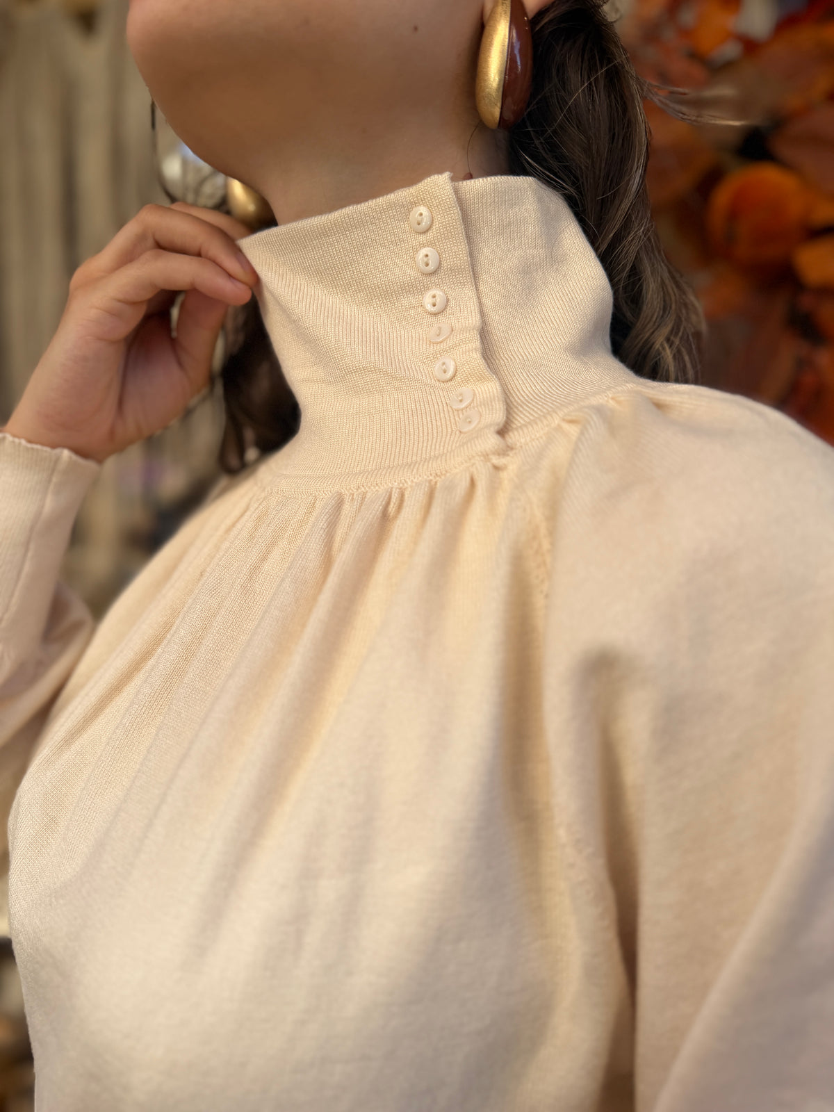 Pull col montant boutonné