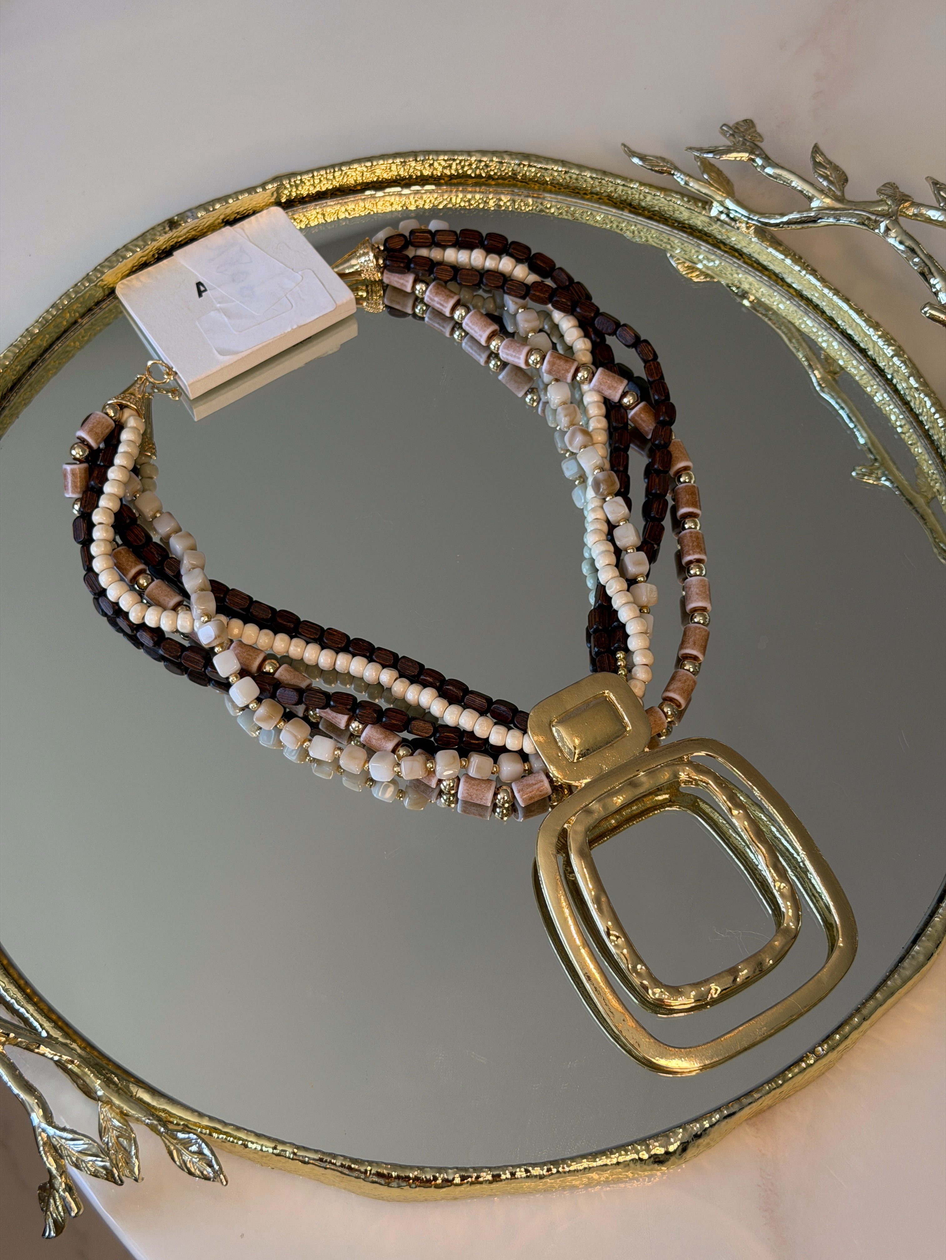 Collier Riviera multi chaînes pendentif doré