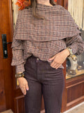 Blouse à carreaux avec cape intégrée